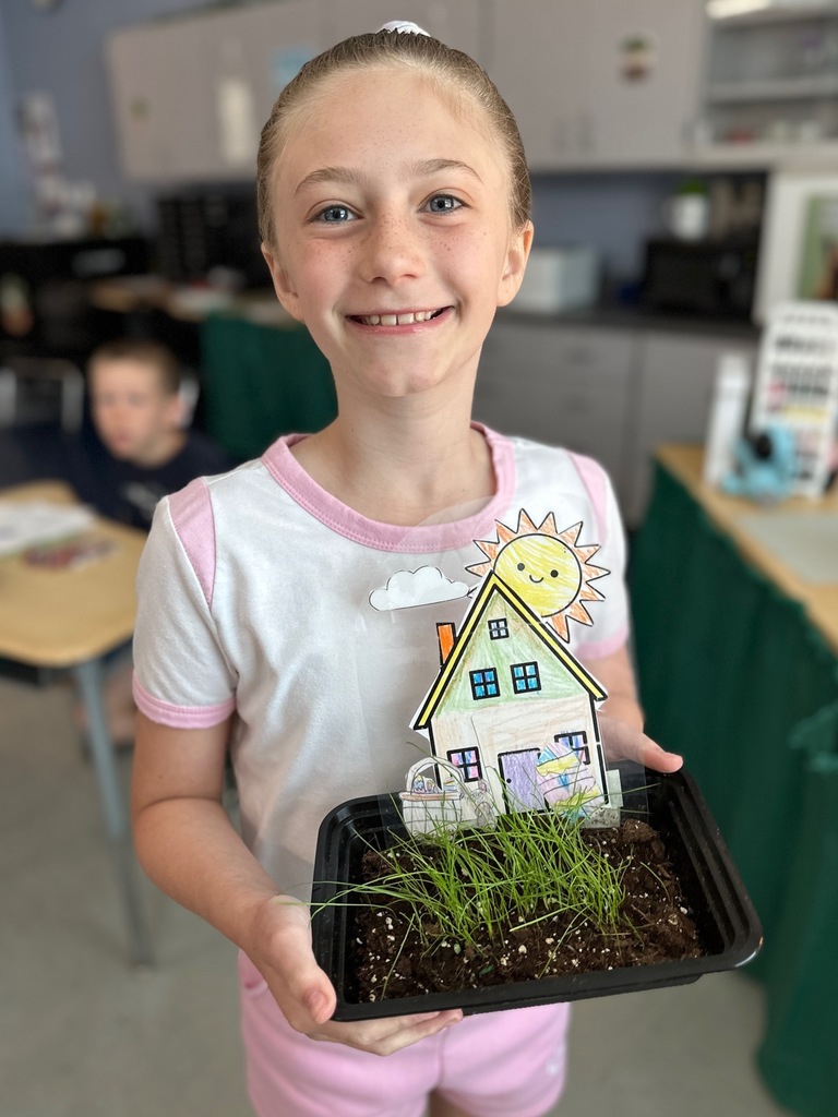 kid(s) with grass plant