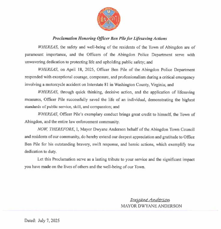 Officer Pile receives the Life Saving Award