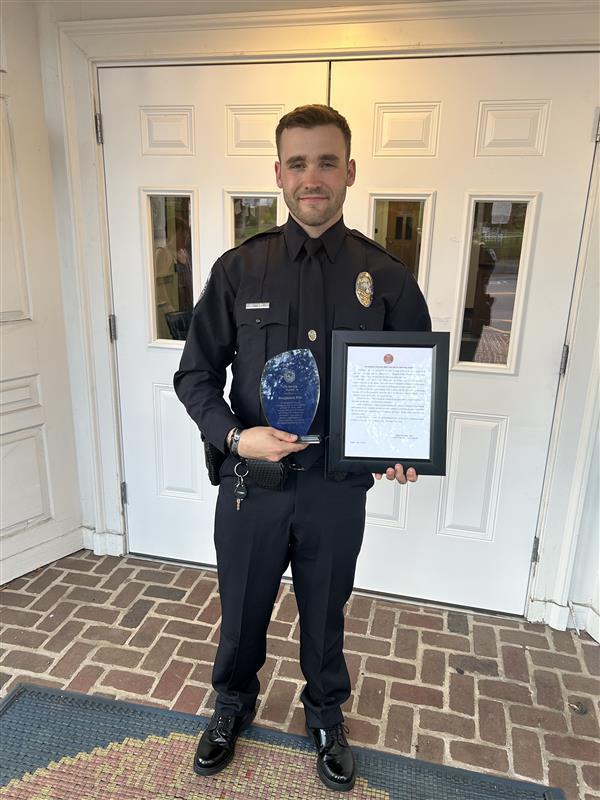 Officer Pile receives the Life Saving Award