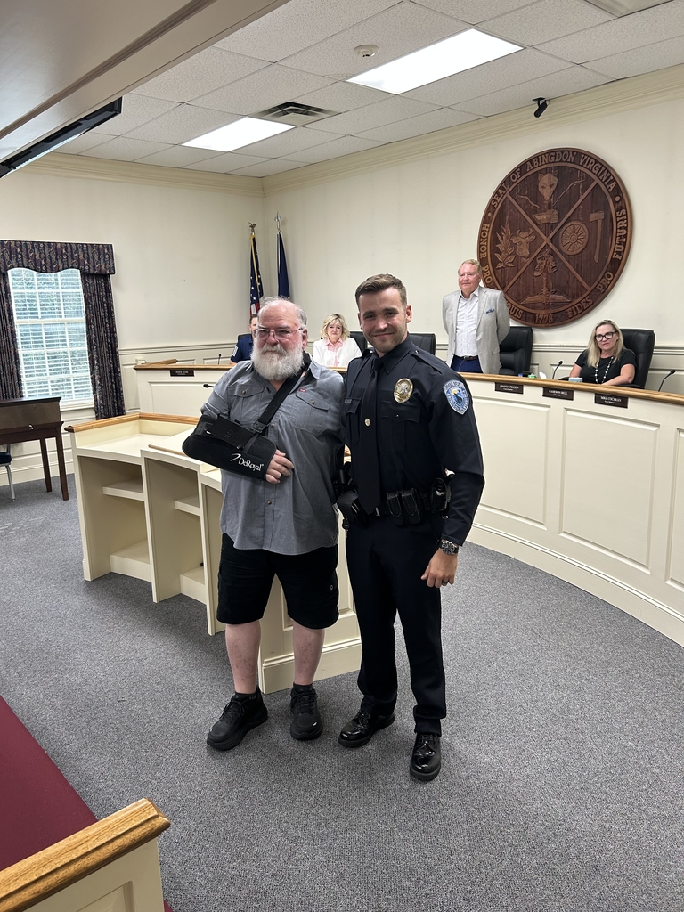 Officer Pile receives the Life Saving Award