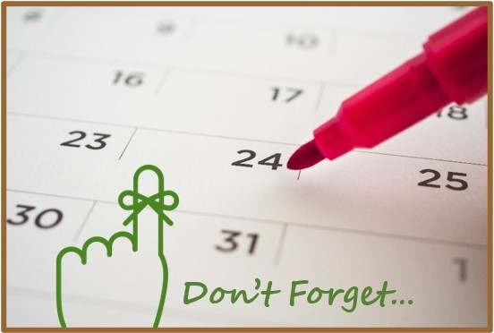 Closeup picture of a calendar and red pen with green text saying Don't Forget