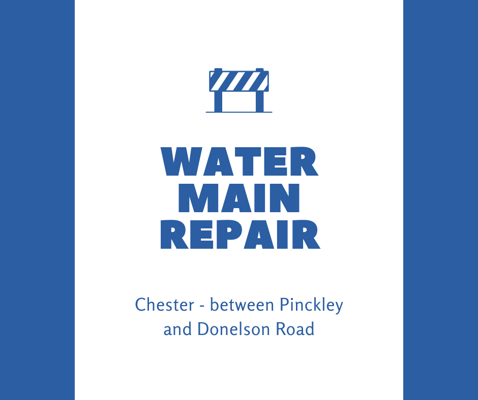 Blue and white Simple Public Service post that says Water Main Repair, Chester between Pinckley and Donelson Rd in the center. Includes a small blue and white construction barrier on top.
