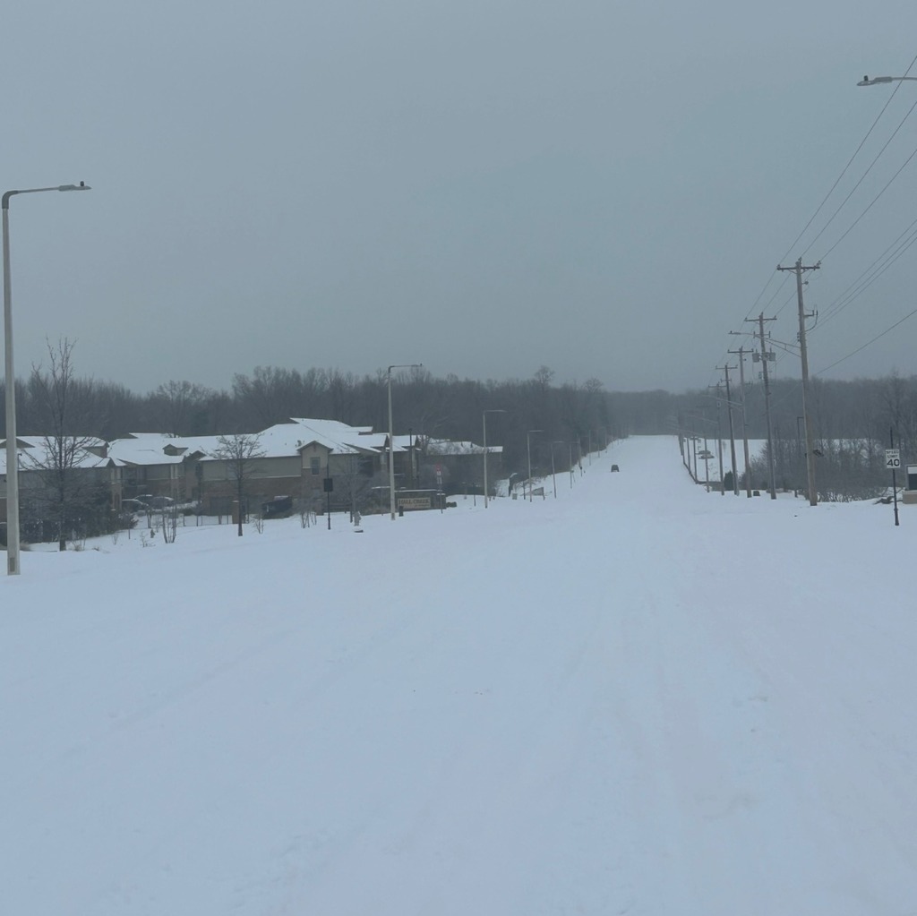 Picture of snow covered Milton Wilson Blvd look east