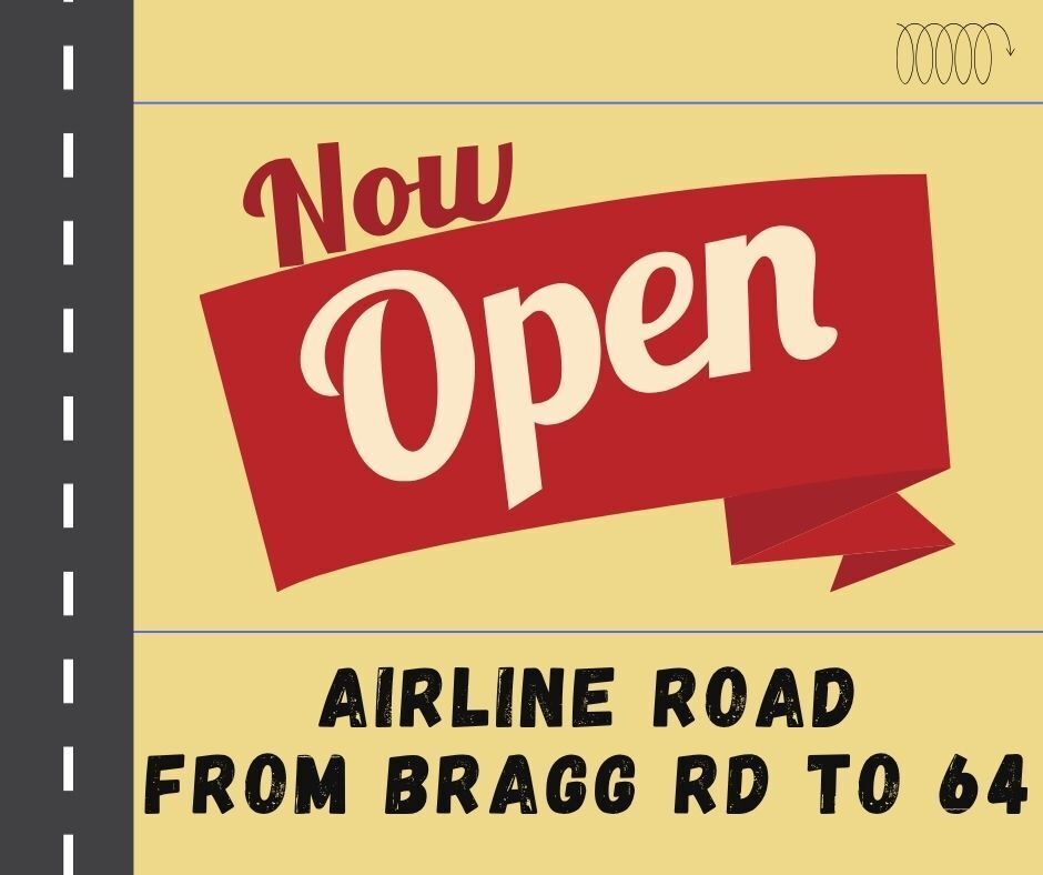 Now Open graphic with yellow background. Text in black says Airline Road from Bragg Rd to 64