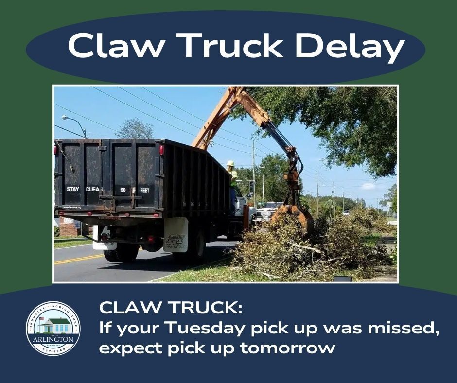 Claw Truck Delay graphic in green and blue. Text says "if your tuesday pickup was missed, expect pick up tomorrow". Includes a picture of a dump truck looking vehicle with an orange claw collecting tree limbs at the side of the road.