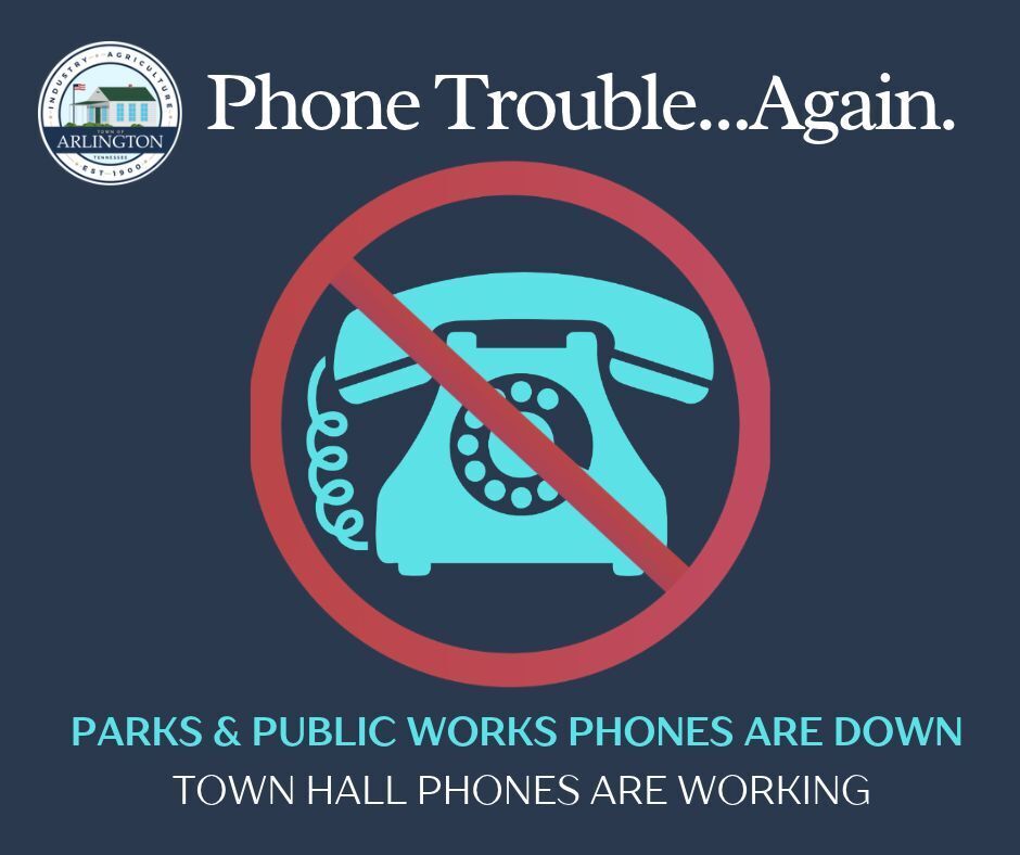 Blue slide with a picture of an old school blue phone in center with red circle/slash over it. Text in white at the top says: Phone trouble...again. At the bottom, text says: parks and public works phones are down. town hall phones are working