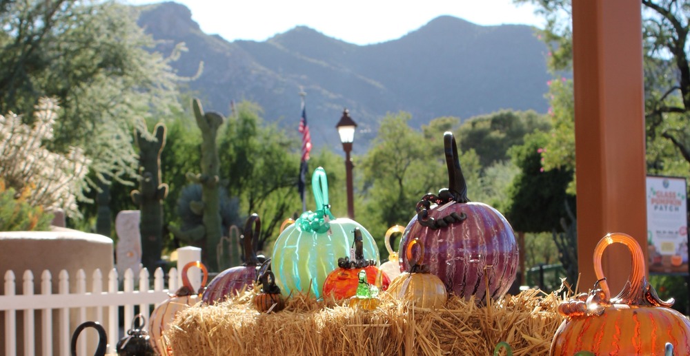 Glass pumpkins on hay bales