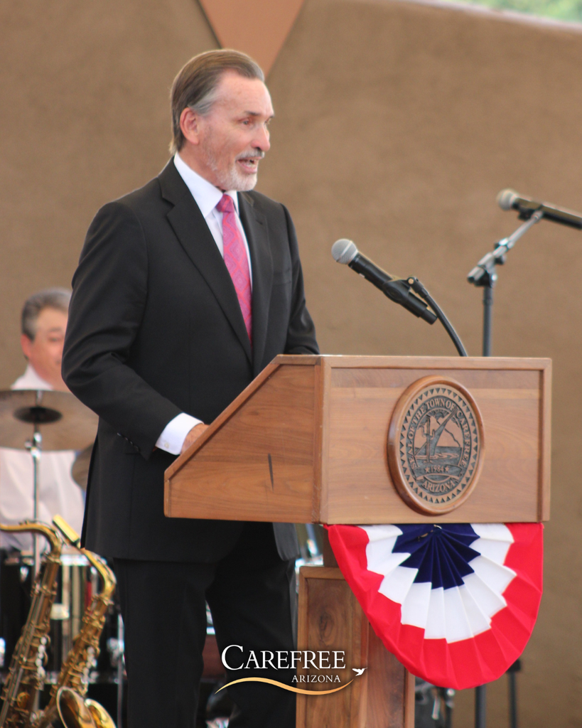 Speaker addressing crowd