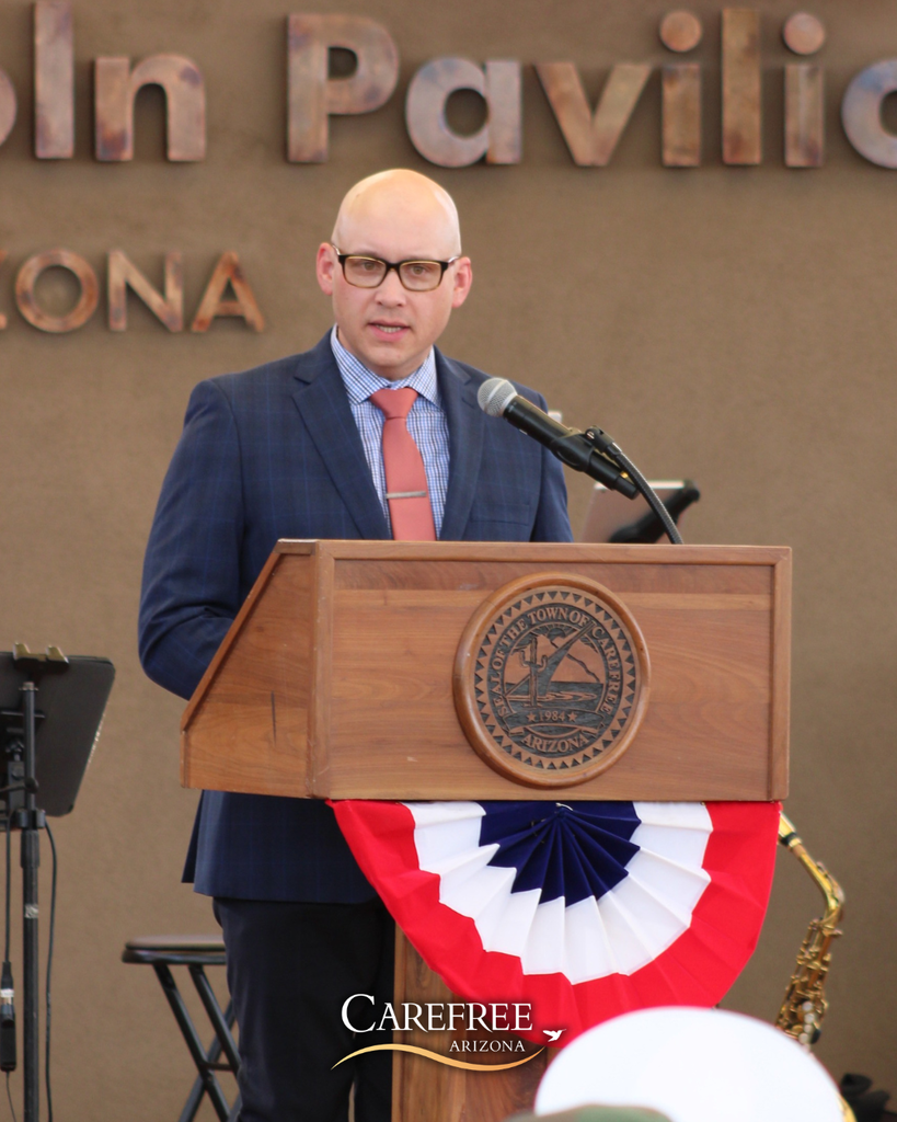 Man speaking to crowd