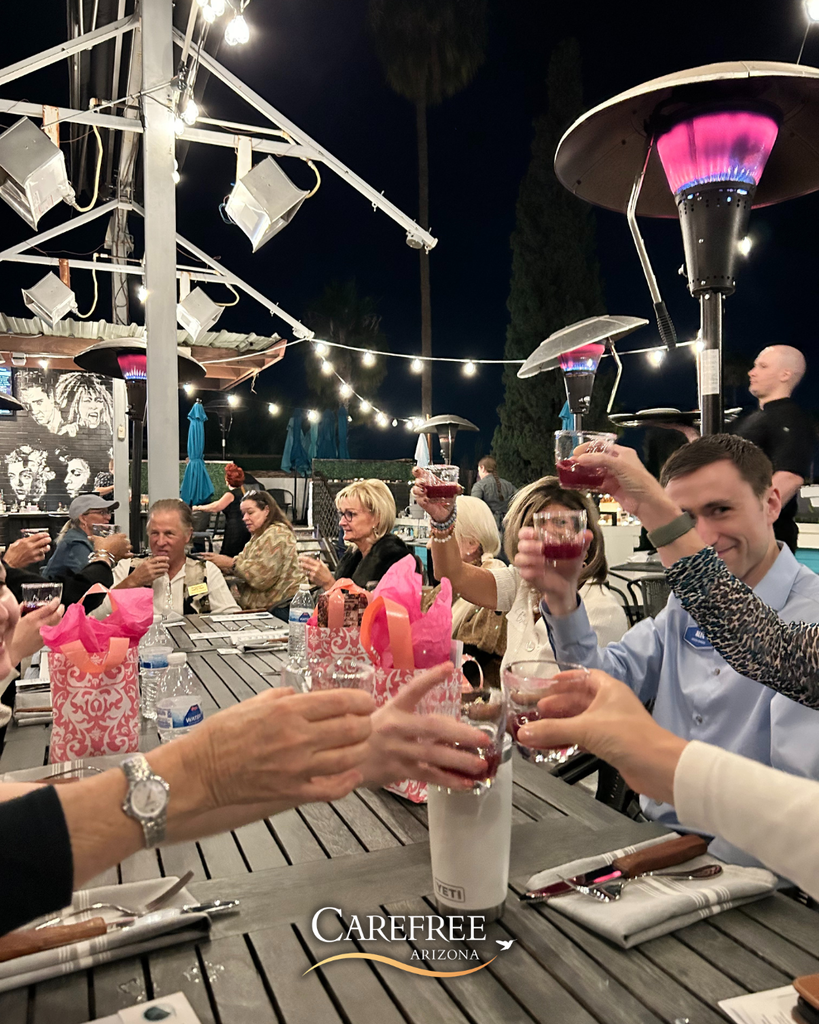 People cheering their drinks