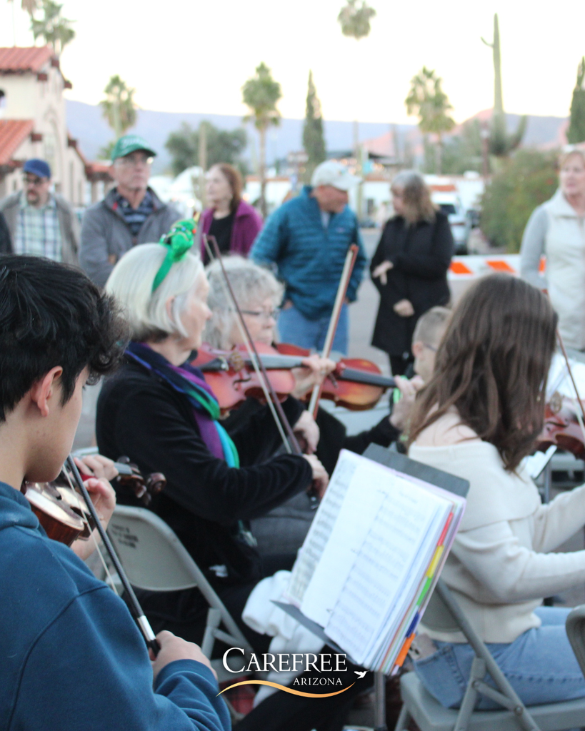 A group of string instrument players