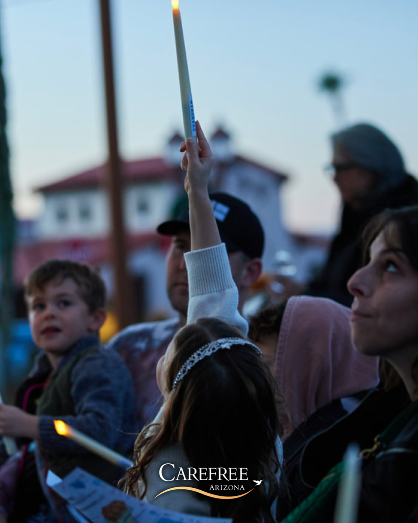 Young girl holding candle