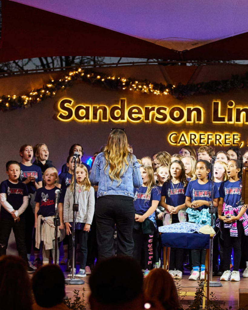 Youth choir singing on stage