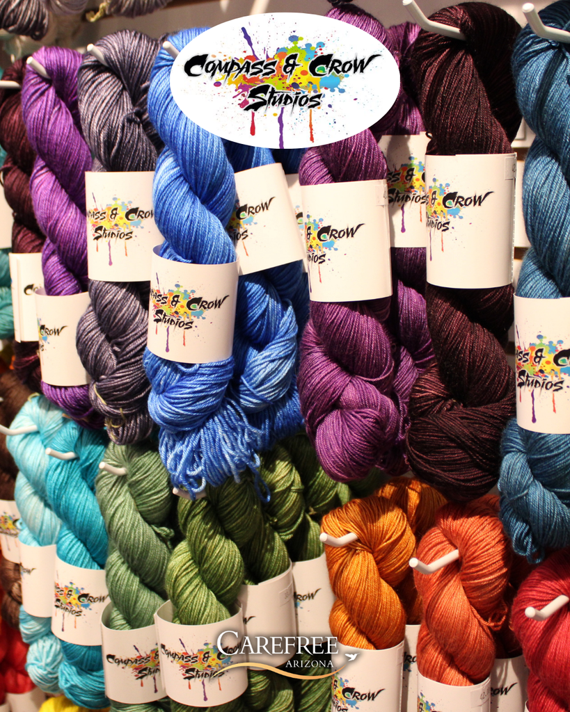 Colorful yarn on wall