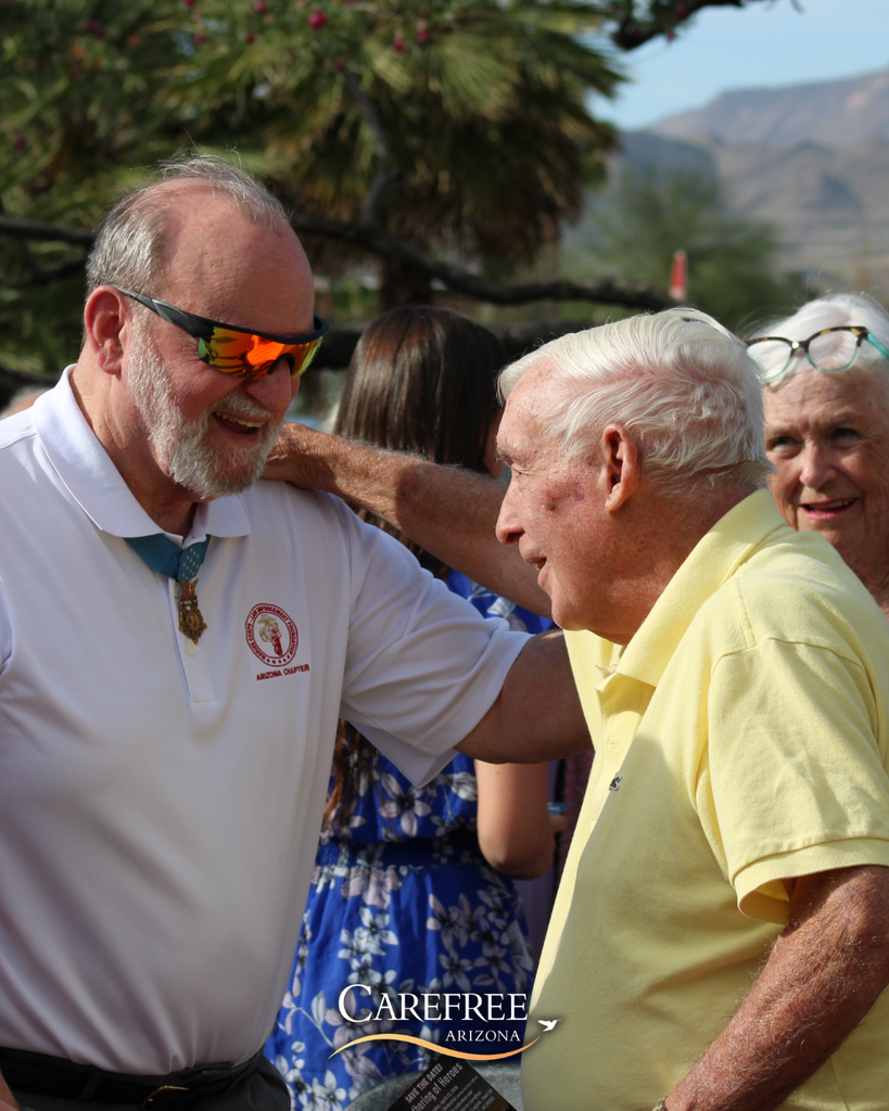 Two men embracing and greeting each other