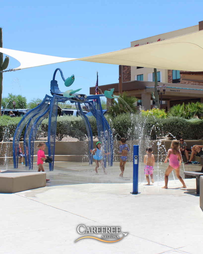 Kids playing at splash pad