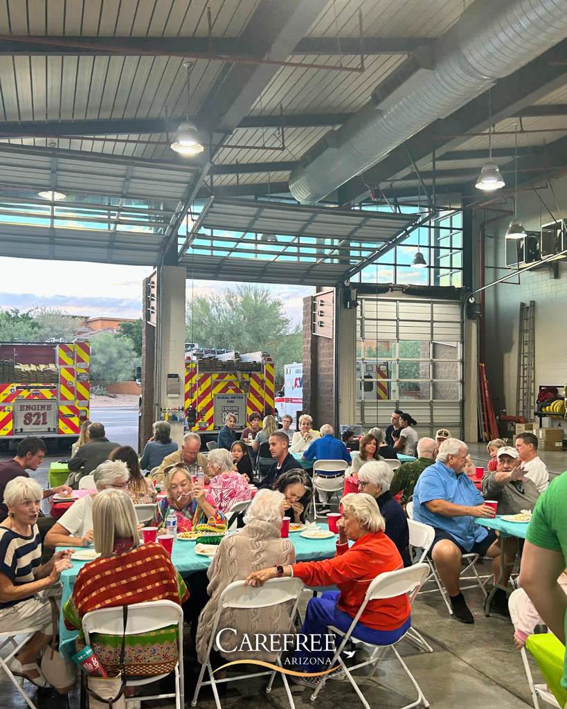 Large group of people sitting at tables