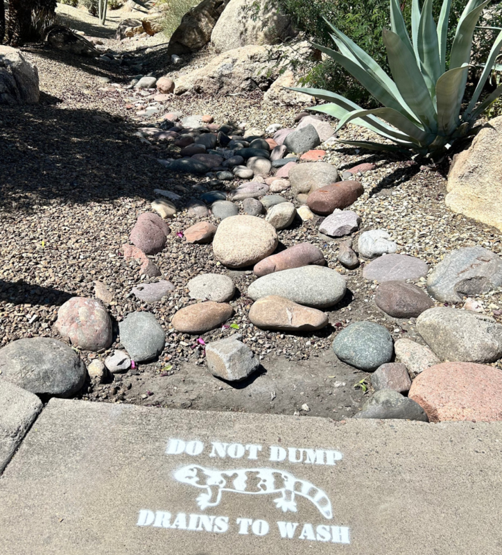Close up of storm drain painting