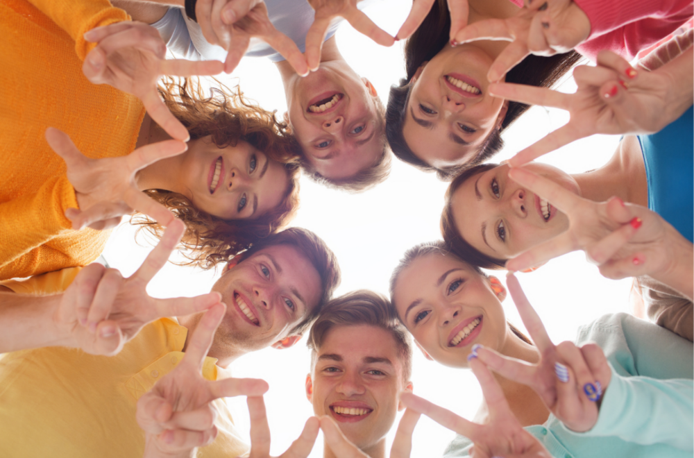 young adults looking into camera