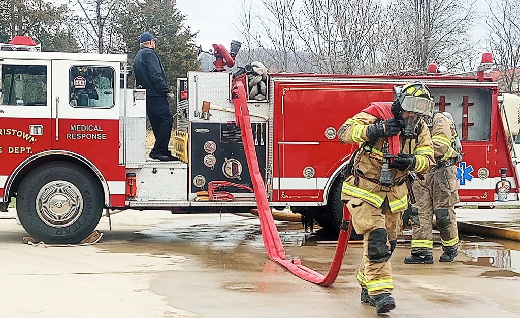 Pulling a hose from a truck