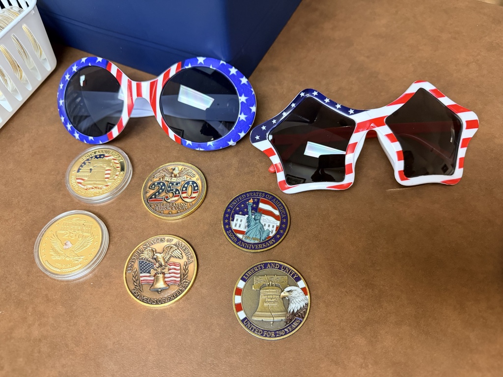 Star Spangled Celebration giveaways includes star shaped American flag glasses, round shaped American flag glasses, commemorative challenge coins celebration America 250. 