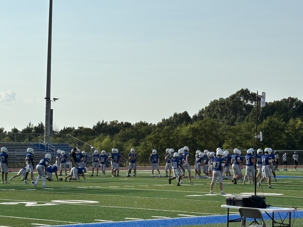 Nolensville High School Football team on the field during First Friday Celebration