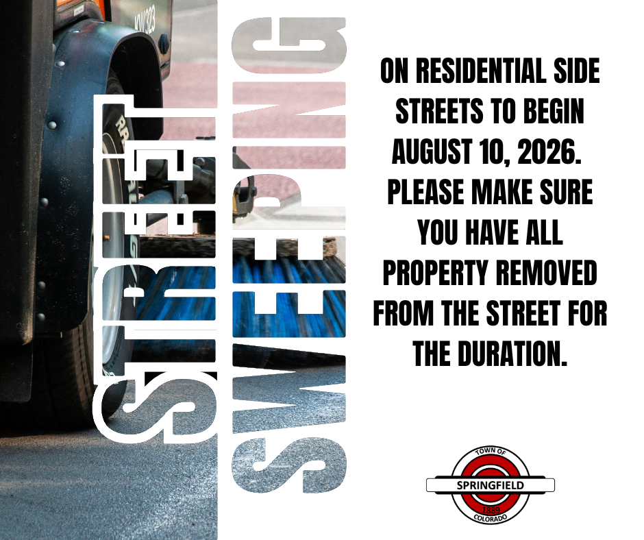 Graphic promoting residential street sweeping in Springfield, Colorado. The left side features a close-up photo of a street sweeper with the words "STREET SWEEPING" displayed vertically in large, bold lettering over the image. The right side contains the message: "On residential side streets to begin August 10, 2026. Please make sure you have all property removed from the street for the duration." The Town of Springfield logo appears at the bottom of the graphic.