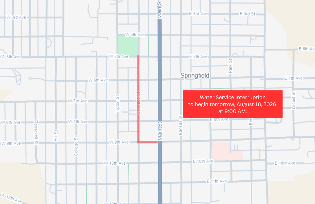 Map of Springfield showing the area affected by a water service interruption, marked in red along Colorado Street from W. 5th Avenue to W. 9th Avenue, then east to Main Street. The interruption is scheduled to begin Tuesday, August 18, 2026, at 9:00 a.m.