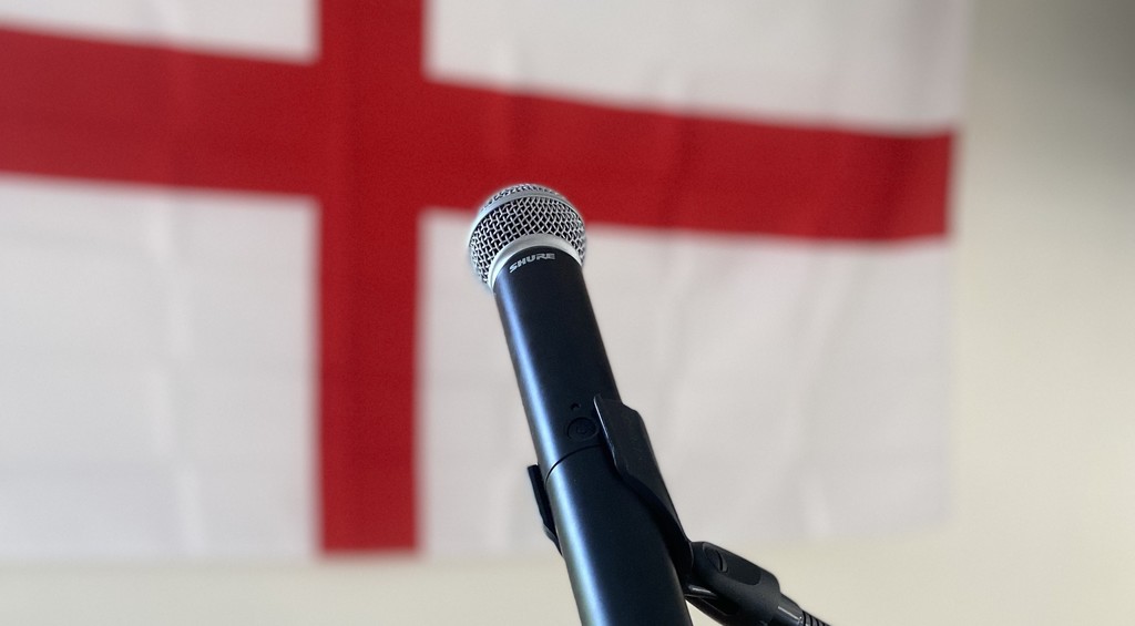 St George flag and microphone