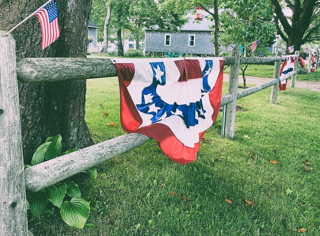 Patriotic Banner on Fence