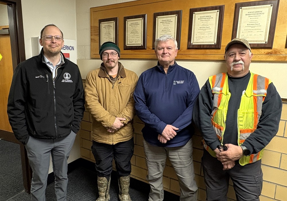 Doug Haiko, second from left, with Town Administrator John Kleinhans, left, and Public Works Director Dwight Ryniewicz and Lead Foreman Jeff Schambach. 