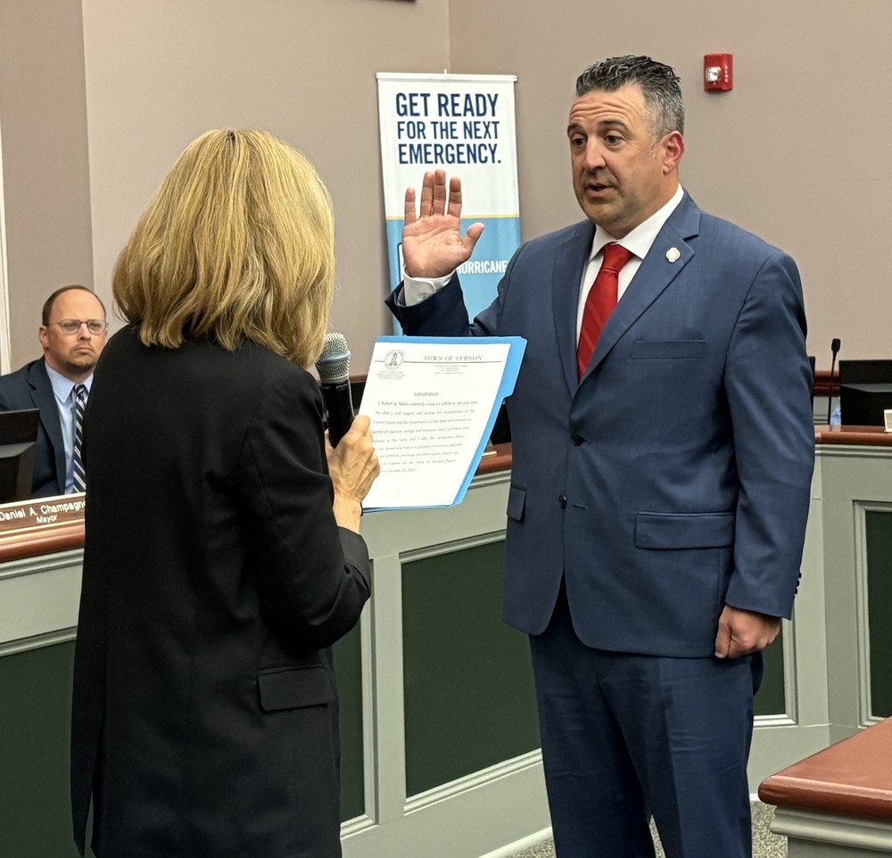 Rob Marra being sworn in
