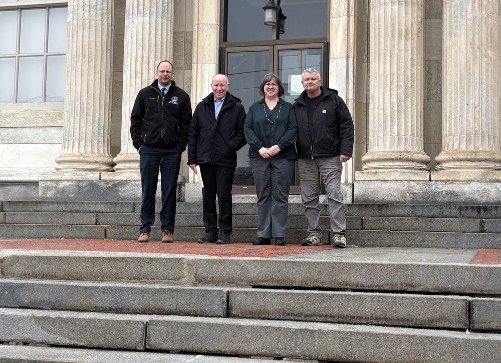 Vernon officials stand at Vernon Public Library