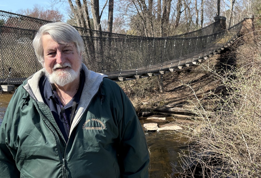 Dave Smith at the suspension bridge he designed