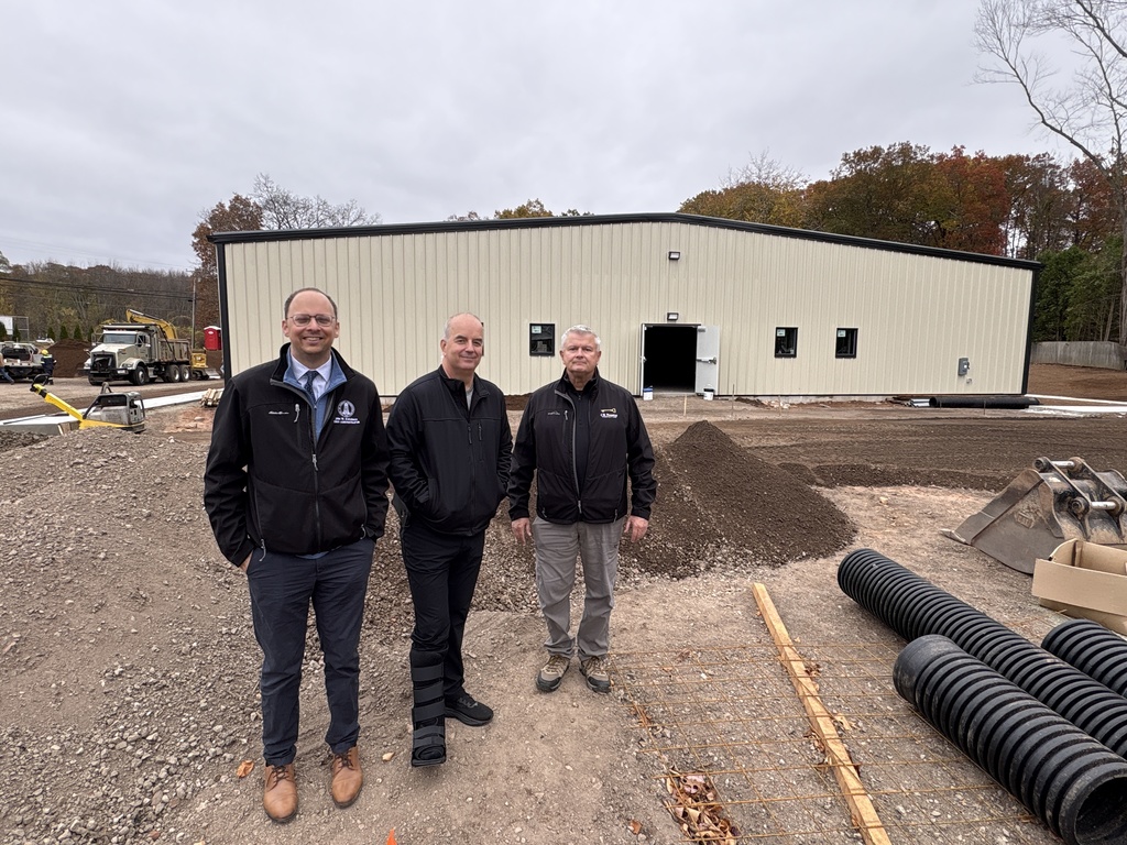 Mayor Champagne with staff at new building for Senior Center