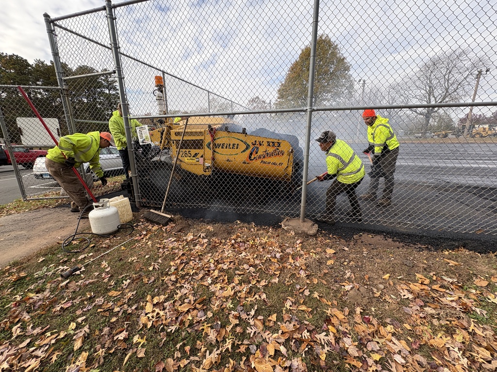 Paving of tennis court at Henry Park
