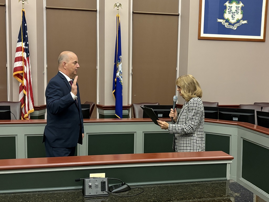 Mayor Dan Champagne is sworn in to a new term.