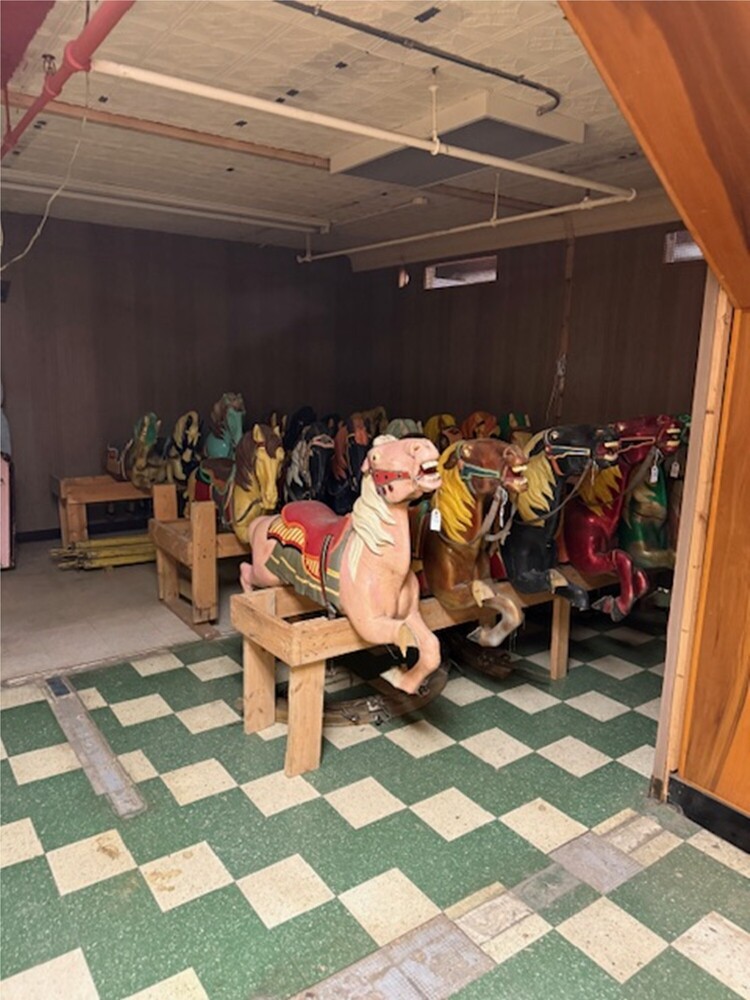 Carousel horses in storage
