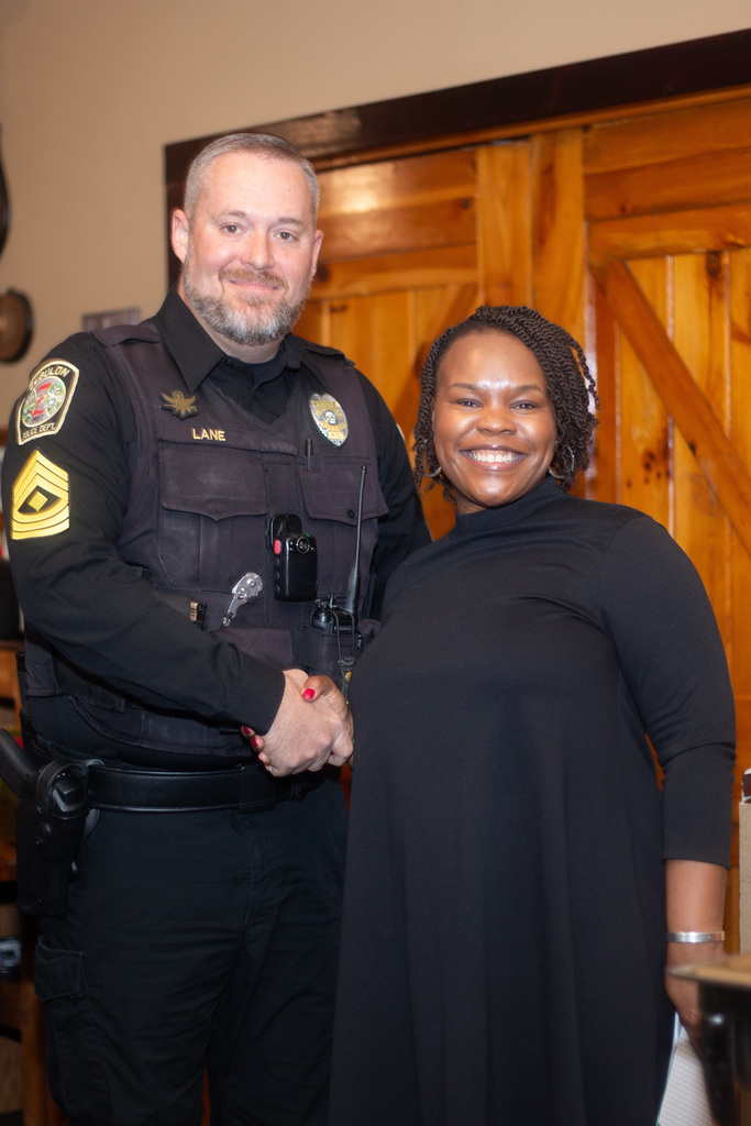 town manager and police officer