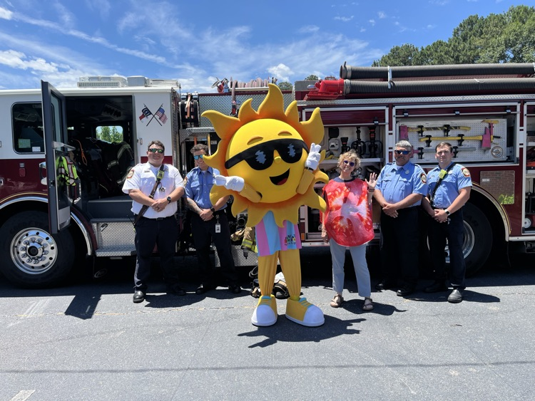 fire truck and a giant sunshine 