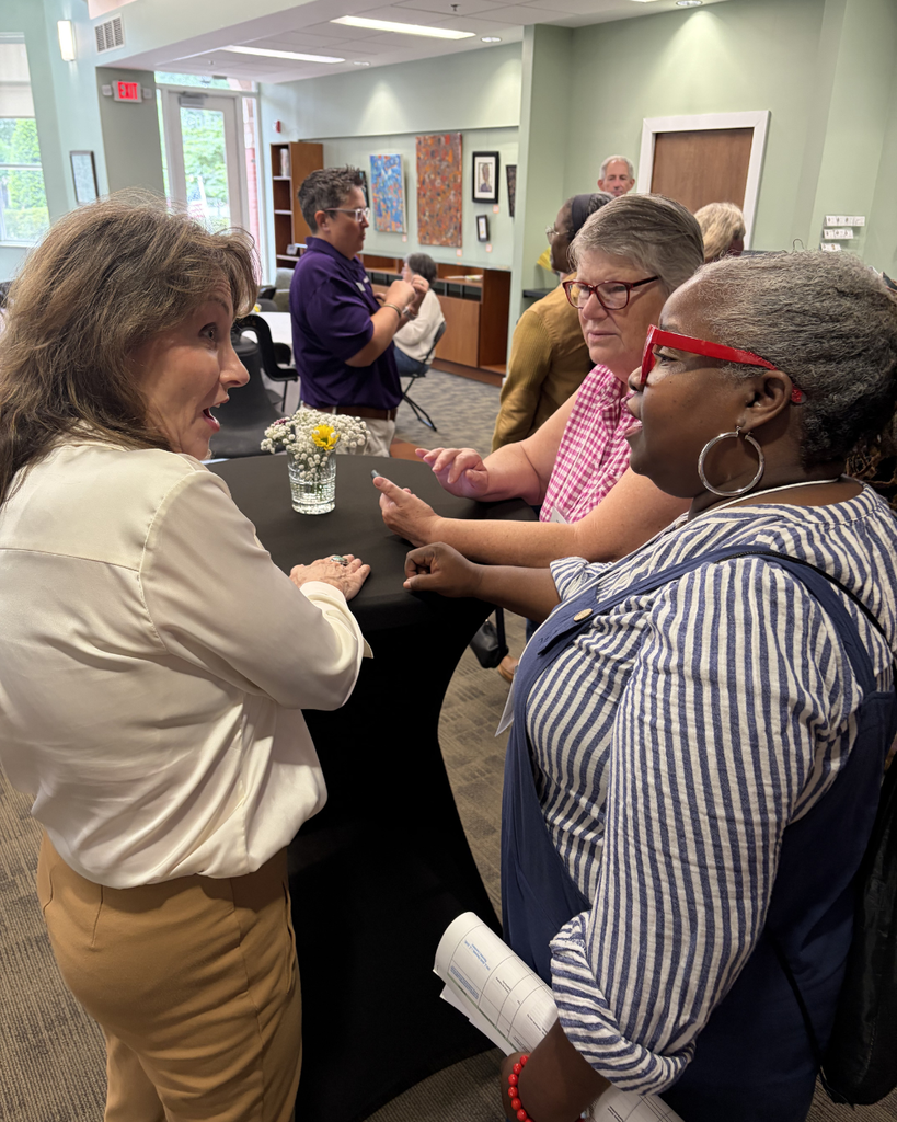 people talking at town hall in zebulon
