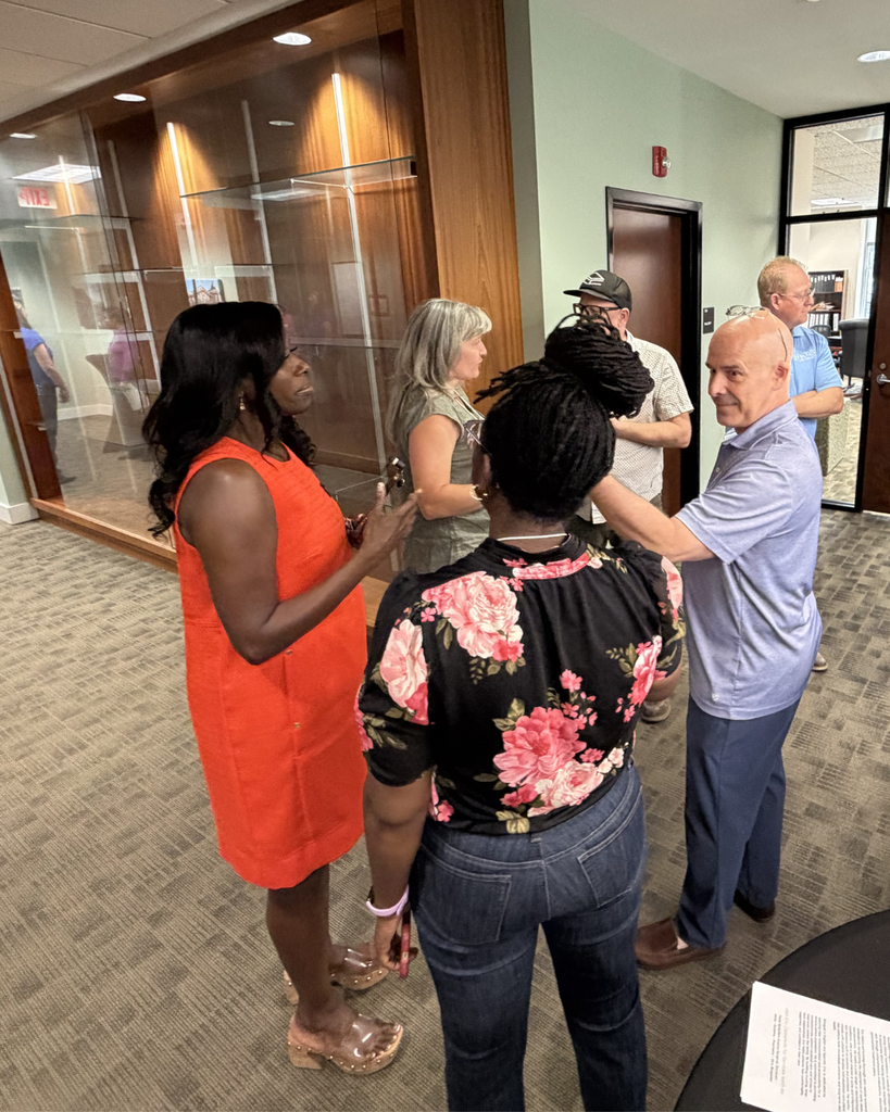 people talking at town hall in zebulon