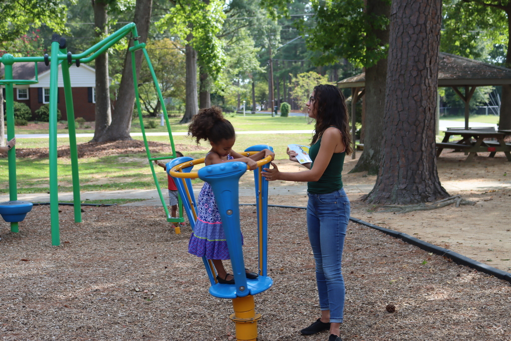 Mother and child playing on playground