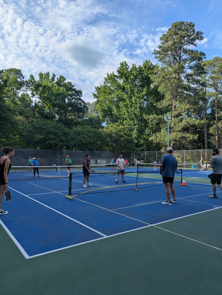 People playing pickleball