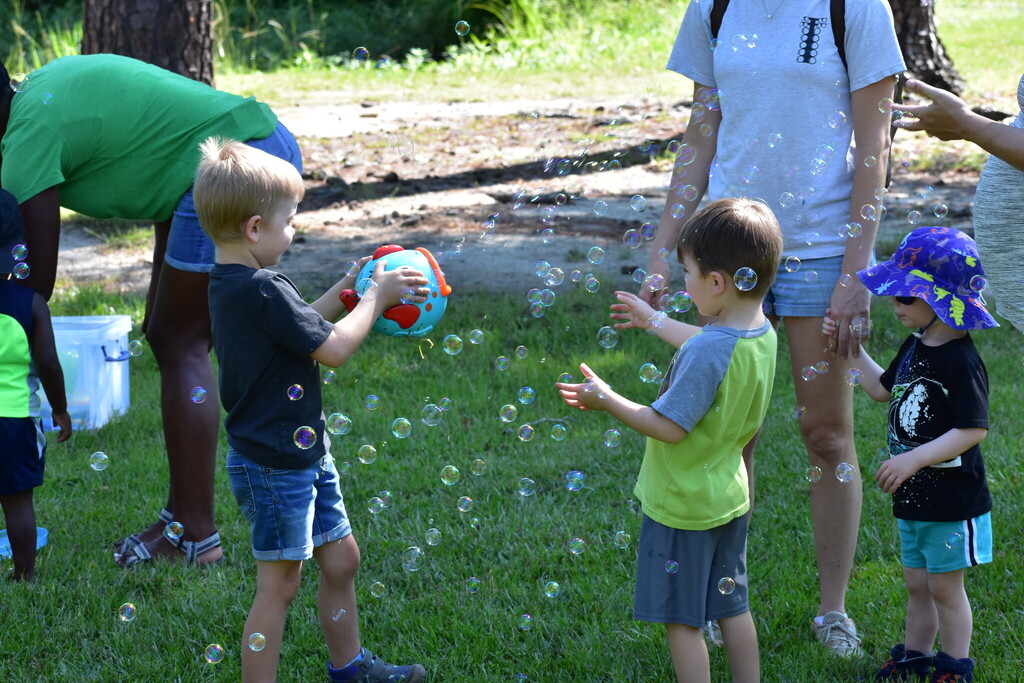 Children playing with bubbles