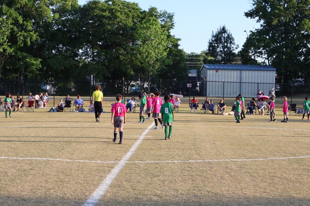 Children playing soccer