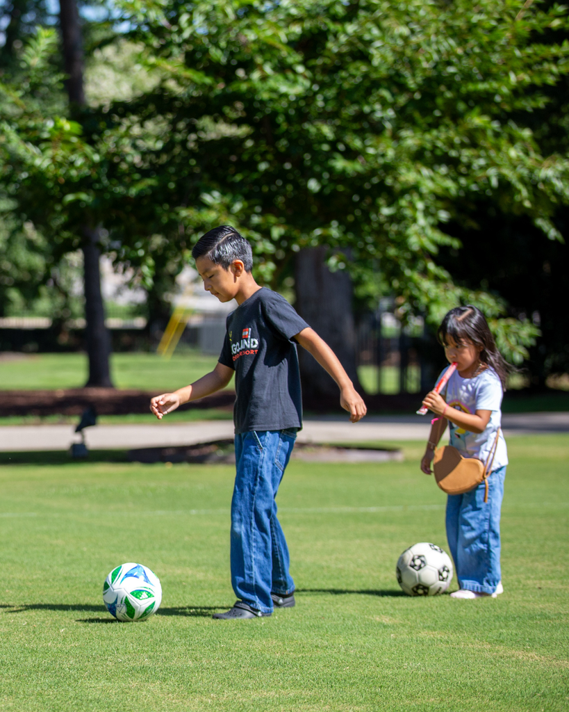 children playing soccer