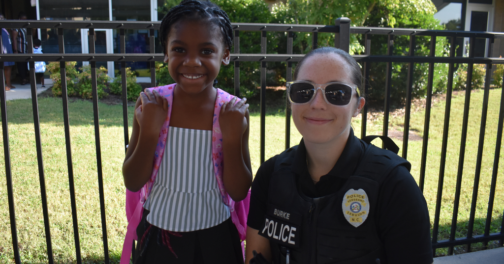 female cop and kid