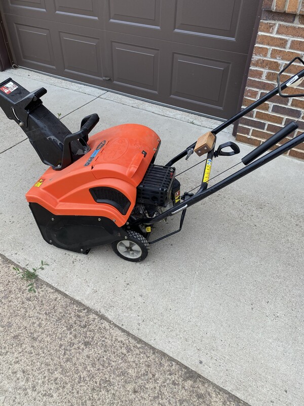 Orange Snow Thrower