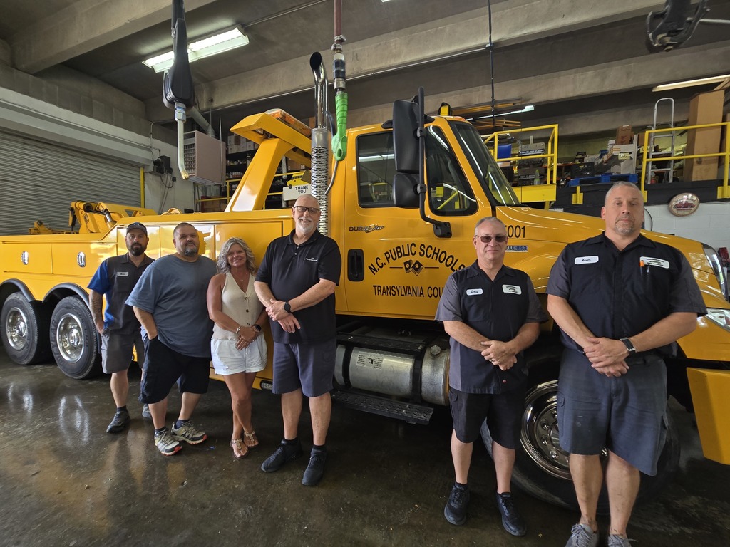 TCS bus garage team